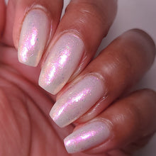nail polish by crystal knockout, angel aura shock, sheer white with pink glow and iridescent flakes